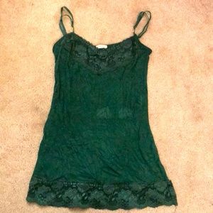 Dark green tank top. It is a size small in women’s with lace around edges.